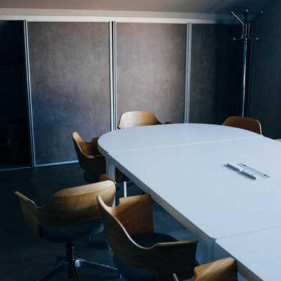An empty, spacious room with natural light.